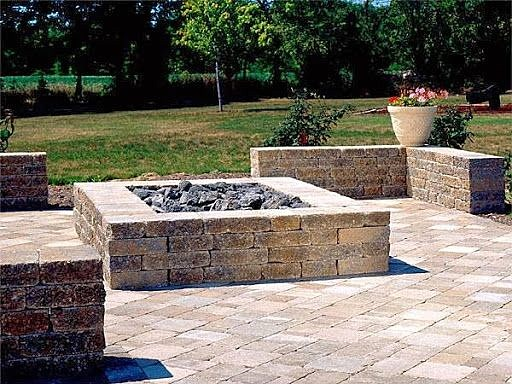 A square fire pit in an outside living area