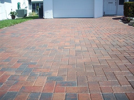 A driveway with brick pavers installation in Palm Beach County