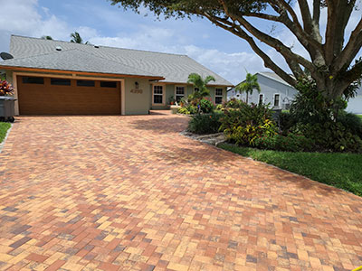 A driveway with brick pavers installation in Palm Beach County.