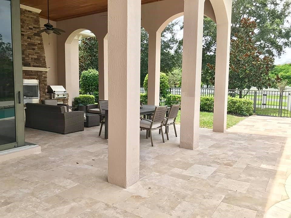 Outdoor living area with porcelain paving