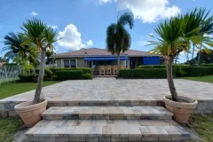 A view of a house with beautiful pavers installation in Palm Beach