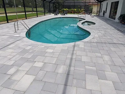 Paver installation for a pool deck in Palm Beach Gardens, FL